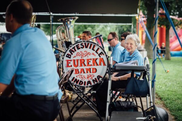 Batesville Eureka Band with smiling elderly woman